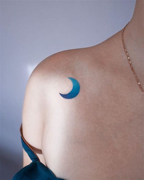 Blue crescent moon by tattooist Nemo inked on the right shoulder Cute ...