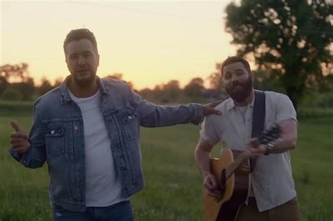 Jordan Davis' 'Buy Dirt' Video (W/ Luke Bryan) Is Country Comfort