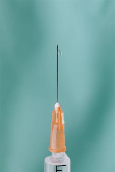 Close-up View Of Needle Of A Vaccine · Free Stock Photo