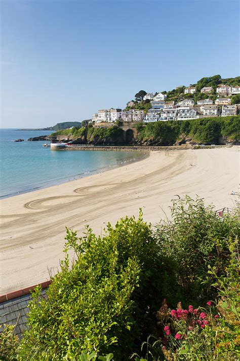 Looe beach Cornwall England with blue sea and sky on a sunny summer day ...