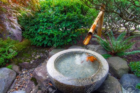 Stone Basin Bamboo Water Fountain in Portland Japanese Garden Stock ...