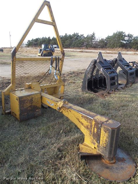 2011 Robo-Cut RC26ERMR skid steer tree saw in Lincoln, KS | Item DA5023 sold | Purple Wave