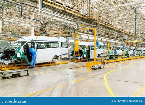 Workers are producing cars editorial stock photo. Image of working - 121379758