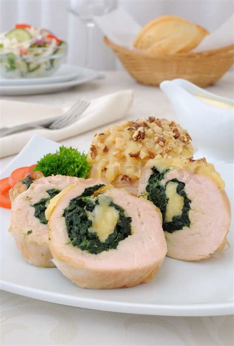 Chicken roulade stuffed with spinach and cheese | Stock image | Colourbox