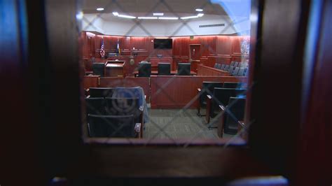 Judge shifts method in dismissing theater trial jurors | 9news.com