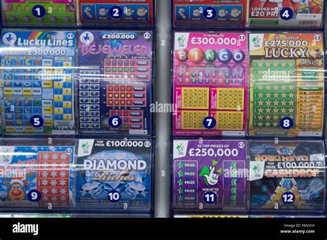 Scratchcards from the National Lottery on sale at a newsagents Stock ...