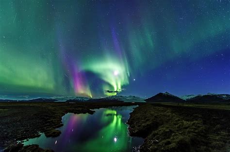 Aurora Borealis Over Iceland Photograph by Günther Egger