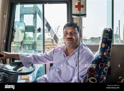 Portrait of Indian driver man on bus. Mathura. India Stock Photo - Alamy