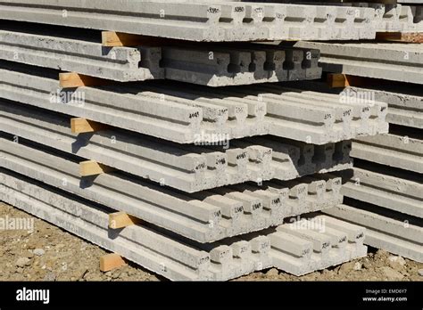 Reinforced concrete beams for a beam and block floor on a UK construction site Stock Photo - Alamy