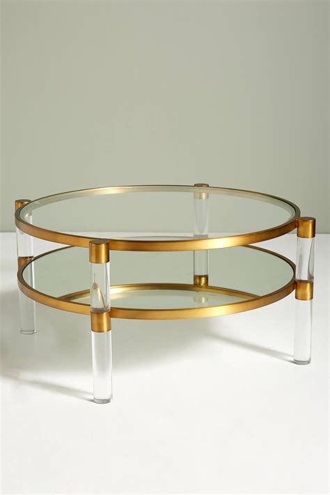 Oscarine Lucite Round Mirrored Coffee Table | Mirrored coffee tables, Coffee table, Stone coffee ...