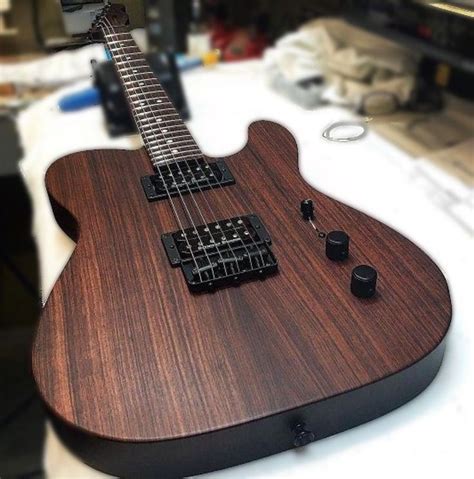 Don’t know of the origin of this T style guitar but I like the wood/finish. | Fender guitars ...