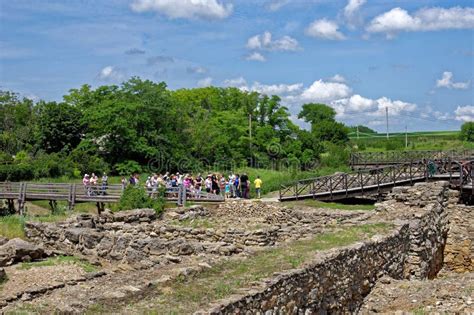 Group of Tourists Visits the Excavation of the Ancient Greek City ...