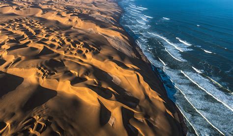 Aerial View Of Sand Dunes And Ocean Stock Photo - Download Image Now ...