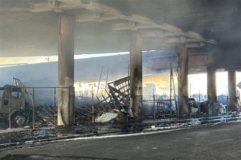 Massive pallet fire shuts down L.A. freeway interchange indefinitely