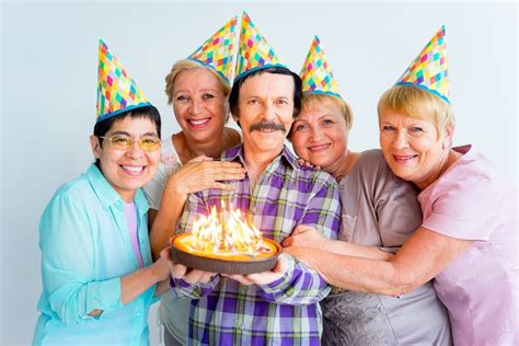 Seniors on a Birthday Party Stock Photo - Image of person, decoration ...