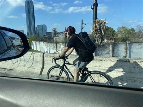 Crazy guy on a bike on the shoulder of 59S, merging onto 610N. : r/houston