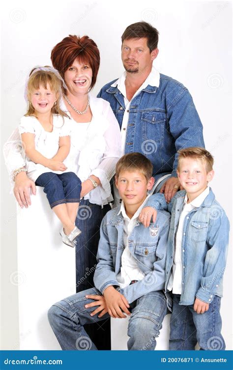 Portrait Of A Young Family With Three Children Stock Image - Image of childhood, parenting: 20076871