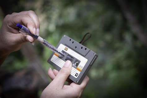 women rewind a cassette tape Vintage compact cassette 3081743 Stock Photo at Vecteezy