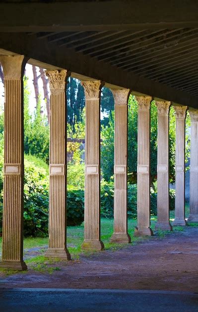 Premium Photo | Ancient architecture row of columns seen from the side