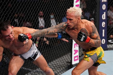 Charles Oliveira can’t see perfectly inside the cage. It isn’t stopping ...