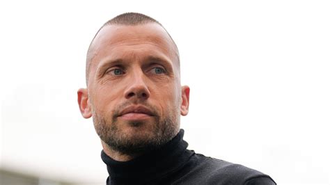 Ajax and John Heitinga terminate contract