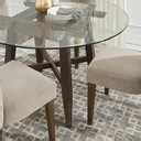 Woodland Avenue Brown Dark Wood Round Dining Table | Rooms to Go