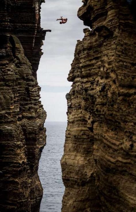 SEE cliff-diving daredevils: Artem Silchenko takes first at Red Bull ...