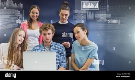 Group of people working on laptop with screen text interface Stock Photo - Alamy