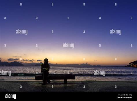 Sunrise on the famous Copacabana beach Stock Photo - Alamy