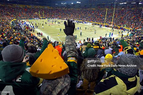 Green Bay Packers fans, also known as Cheeseheads, pack Lambeau Field ...