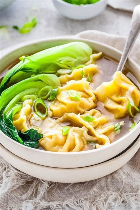 This Wonton Soup recipe is epically delicious with all the many layers of flavor and juicy ...