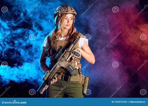 Woman in Army Pros and Cons.Beautiful Woman in Military Ammunition and Weapon. Stock Image ...