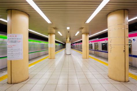 Commuters and Trains in Subway Station in Tokyo Editorial Stock Image ...