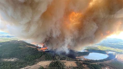 Almost 25,000 people in Western Canada evacuated as wildfires rage ...