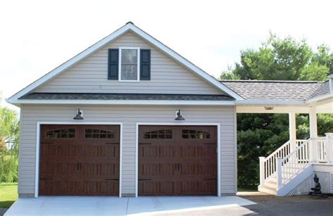 Two-car garage addition with a covered walkway in Adamstown, MD ...