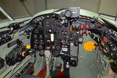 the cockpit of an airplane with many instruments