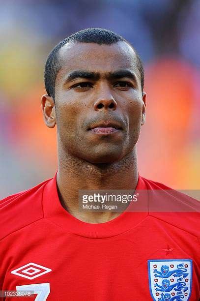 Ashley Cole lines up for the national anthems prior to the 2010 FIFA World Cup South Africa ...