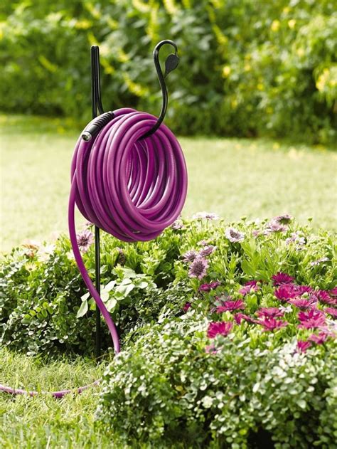 23 Creative Ways To Store Your Garden Hose - Garden Lovers Club ...