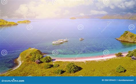 Aerial View of a Pink Beach in Flores, with a Tourist and a Yatch Stock ...