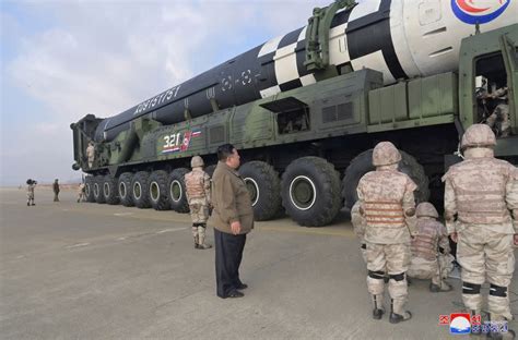 North Korea's Kim oversees ICBM test, vows more nuclear weapons