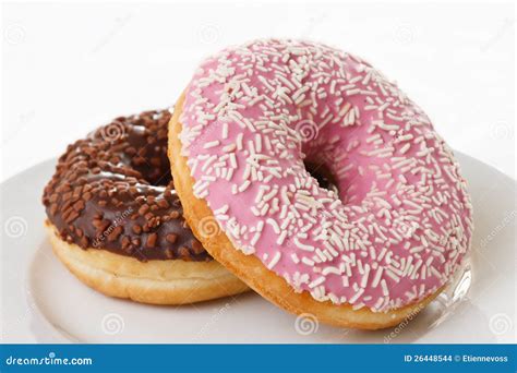 Pink And Chocolate Donuts With Sprinkles Stock Images - Image: 26448544