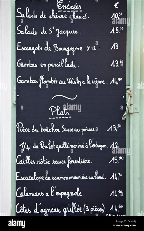 Traditional French Cafe menu of Entrees and Plats in quaint town of Castelmoron d'Albret in ...