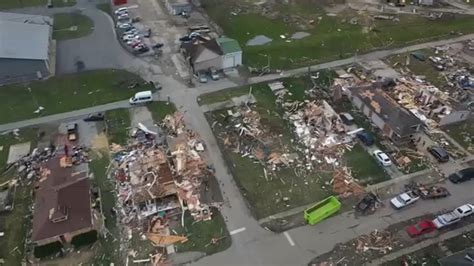 Storm damage: Roofs ripped off homes in Merrillville, Indiana, after at ...