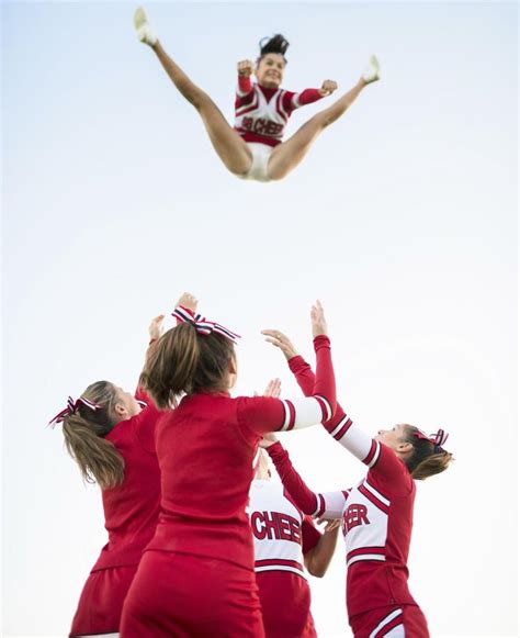 A Guide on How to Do Eyecatching Cheerleading Stunts Safely | Cheerleading stunt, Cheerleading ...