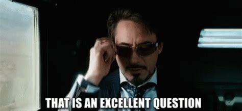 Tony Stark Eyeglass GIF - Tony Stark Eyeglass Exellent Question - Discover & Share GIFs