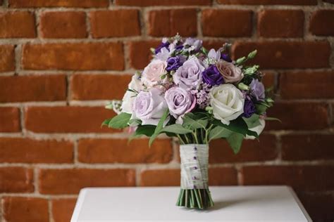 Weddings at The Purple Pansy flower boutique: A gorgeous bouquet of dark purple, lavender and ...