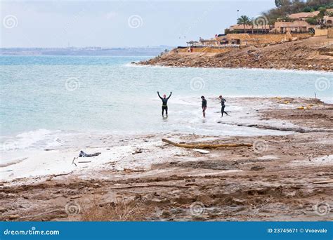 People in Mineral Mud in Dead Sea, Jordan Editorial Photo - Image of ...