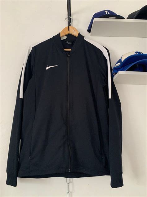 Nike track jacket, Men's Fashion, Coats, Jackets and Outerwear on Carousell