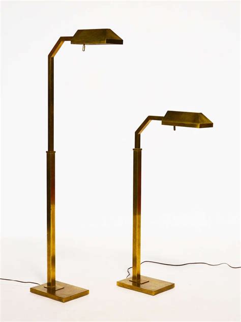 Pair of brass Chapman adjustable reading lamps at 1stDibs