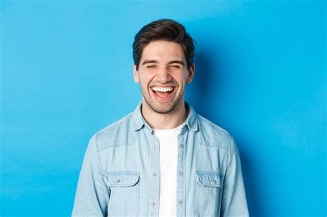 Free Photo | Close-up of happy young bearded man in casual clothes ...